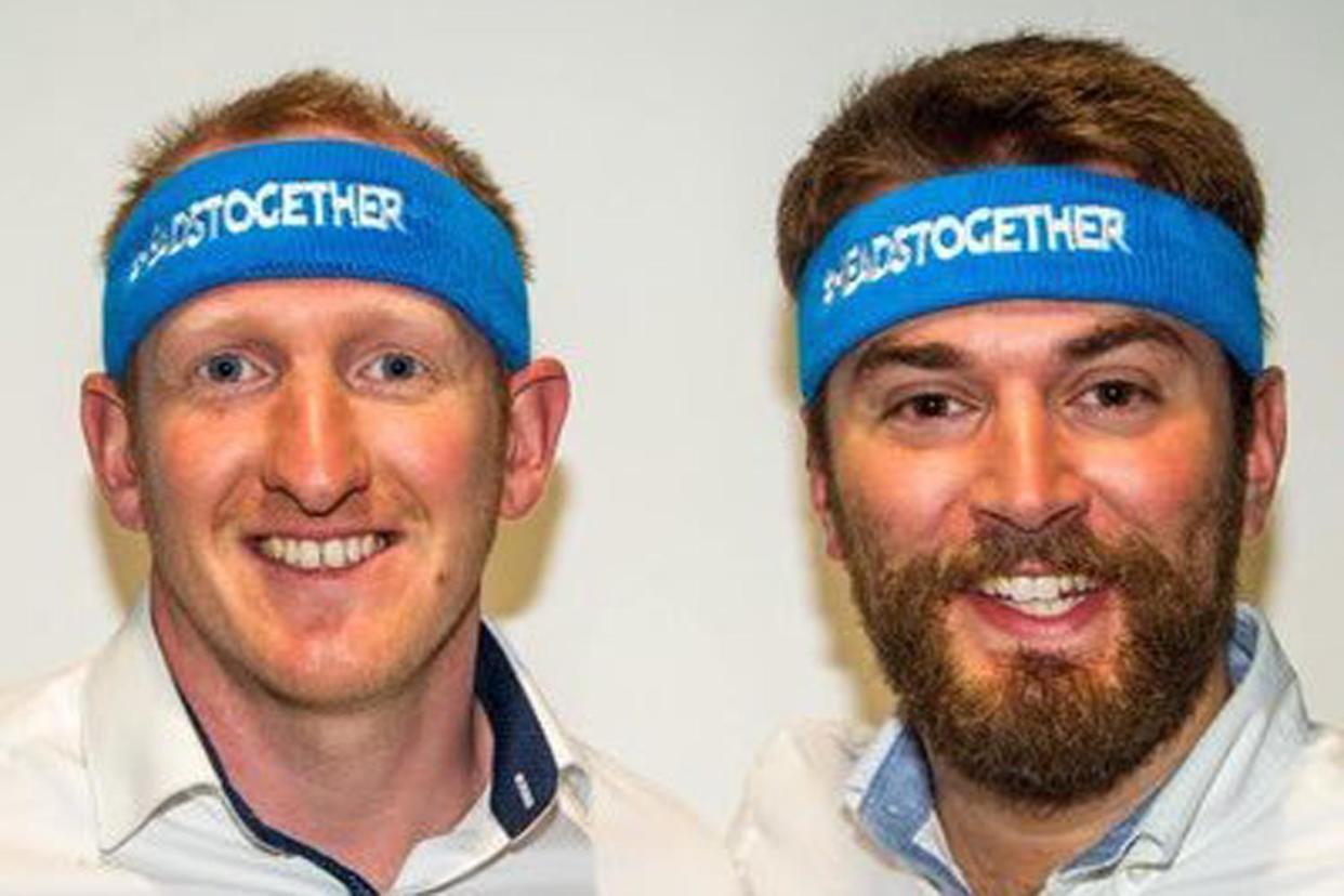 Heads together: Neil Leybourn and Jonny Benjamin tackled the marathon side by side: Jonny Benjamin/Twitter