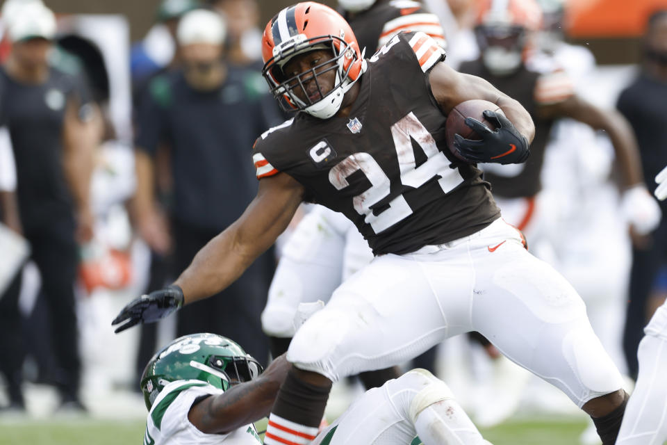 Cleveland Browns running back Nick Chubb (24) is stopped by New York Jets safety Jordan Whitehead during the second half of an NFL football game, Sunday, Sept. 18, 2022, in Cleveland. (AP Photo/Ron Schwane)