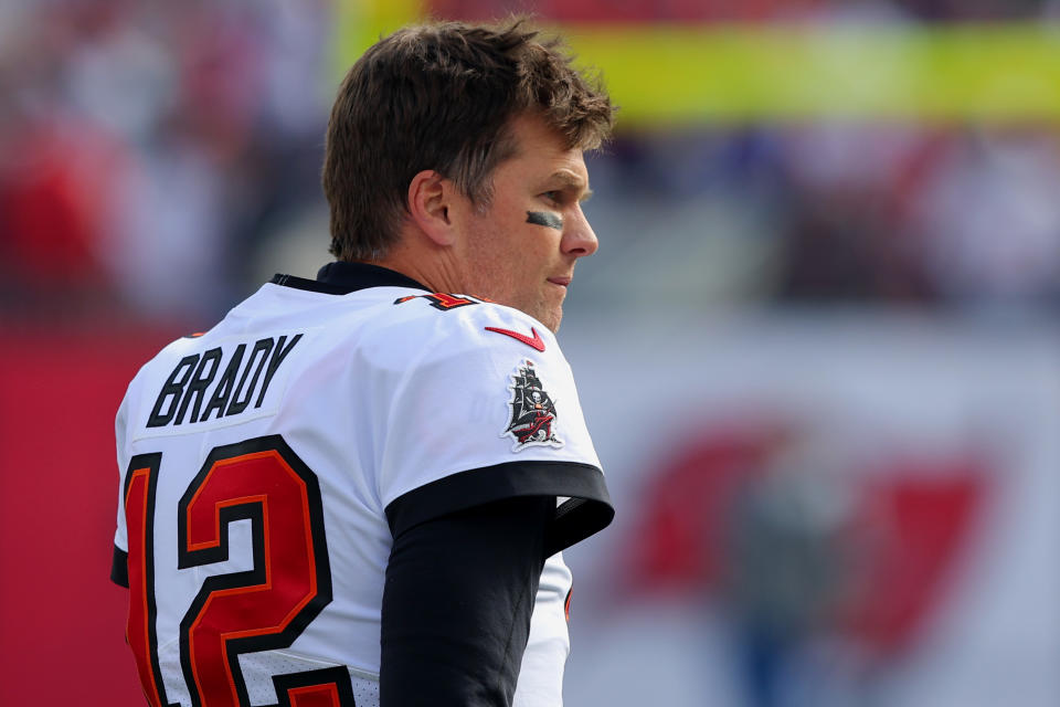 Tom Brady #12 of the Tampa Bay Buccaneers looks on before the game against the Los Angeles Rams in the NFC Divisional Playoff game at Raymond James Stadium on January 23, 2022 in Tampa, Florida. (Photo by Kevin C. Cox/Getty Images)