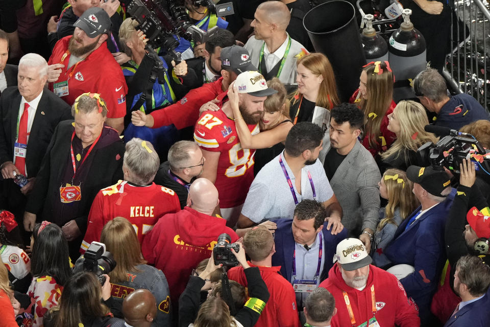 Kansas City Chiefs tight end Travis Kelce (87) hugs his girlfriend Taylor Swift after the team's victory over the San Francisco 49ers during the NFL Super Bowl 58 football game Sunday, Feb. 11, 2024, in Las Vegas. (AP Photo/David J. Phillip)