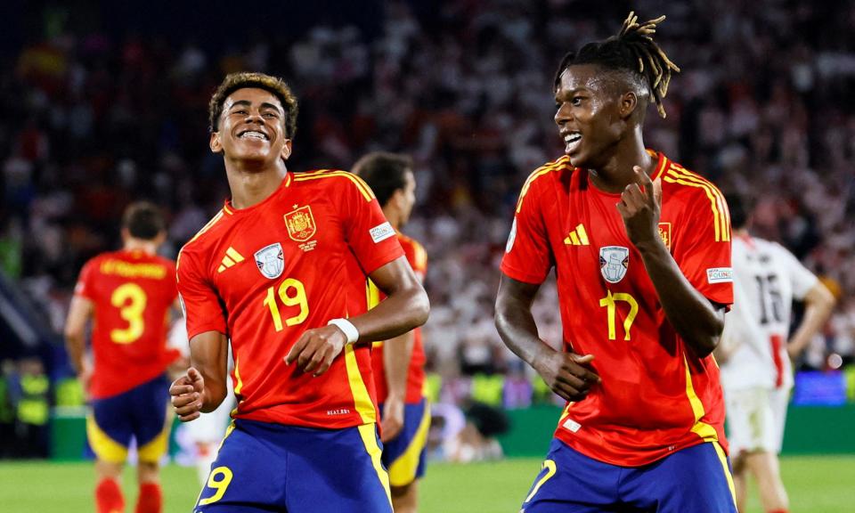 <span>Nico Williams (right) celebrates scoring Spain’s third goal with teenage star Lamine Yamal.</span><span>Photograph: Wolfgang Rattay/Reuters</span>