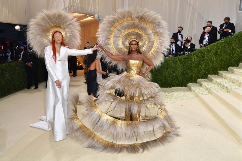 Iman and fashion designer Harris Reed arrive for the 2021 Met Gala at the Metropolitan Museum of Art (AFP via Getty Images)