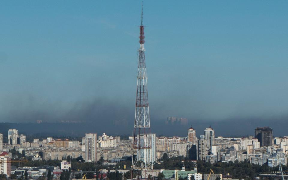 Smokes rises on outskirts of the city during a Russian missile attack in Kyiv, Ukraine - Anna Voitenko/Reuters