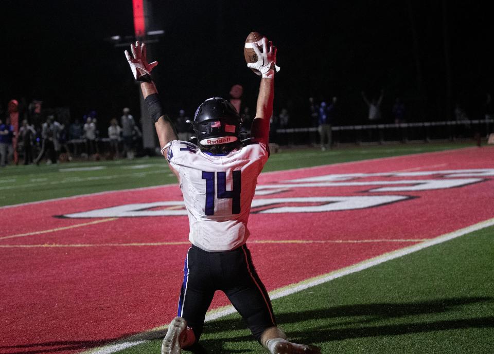 Max Varga of Community School of Naples celebrates a touchdown catch against ECS on Friday, Nov. 3, 2023, in Fort Myers.