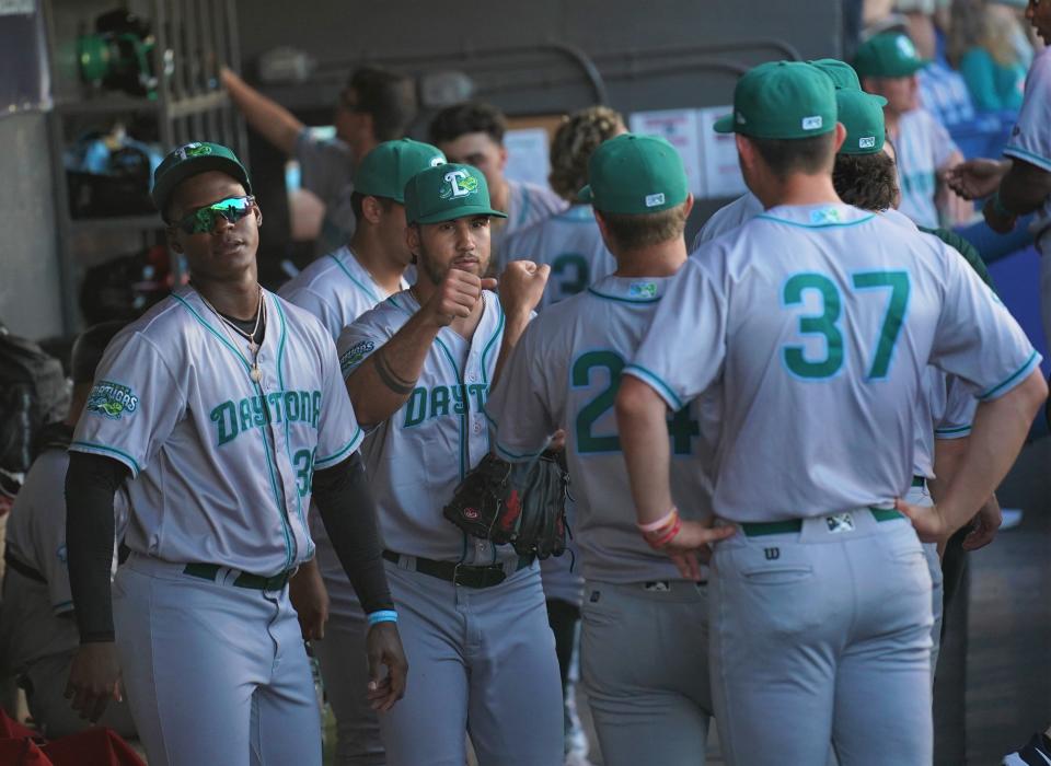 Jensen Beach graduate Lyon Richardson is congratulated by his teammates after striking out seven batters in three scoreless innings for the Daytona Tortugas against the St. Lucie Mets in a minor league baseball game on Friday, April 7, 2023 in Port St. Lucie.