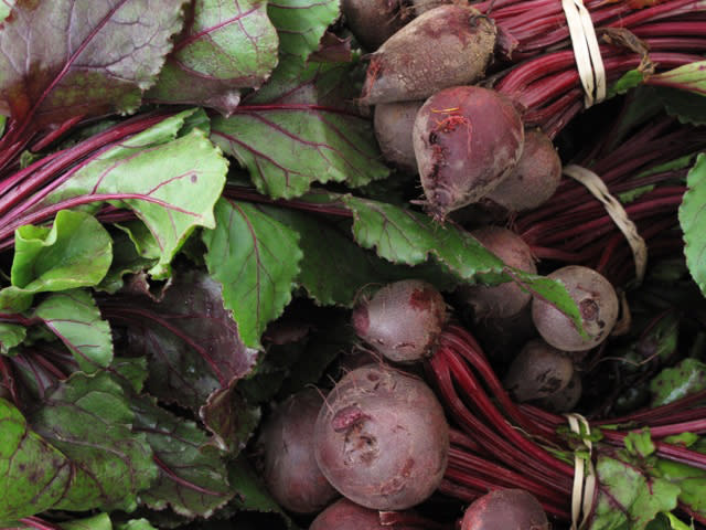 In this May 6, 2010 photo, beets for sale are seen at the Farmer's Market, in Dupont Circle, Washington. Many vegetables get woodier, less succulent and lose some of their sweetness as they grow more mature. Some, however, like new potatoes, radishes, baby carrots, zucchini, miniature cucumbers, spring peas, turnips and beets offer up their best flavors while young. (AP Photo/Dean Fosdick)