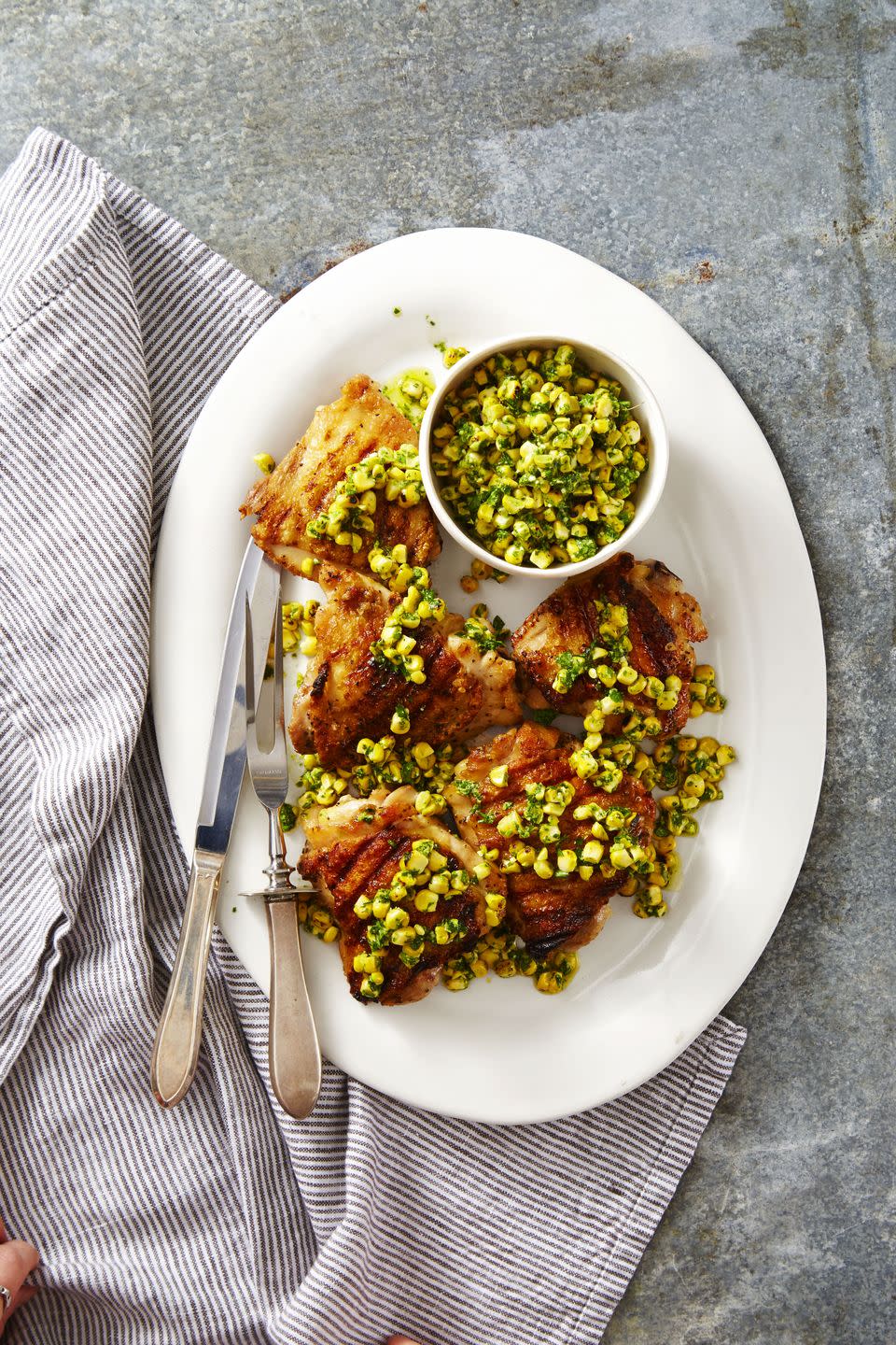 <p>Think salsa can only be the tomato variety? Think again: this cheesy-herby fresh corn version is peak summer, especially when piled on top of juicy chicken thighs.</p><p><em><a href="https://www.goodhousekeeping.com/food-recipes/a40851/grilled-chicken-with-herbed-corn-salsa-recipe/" rel="nofollow noopener" target="_blank" data-ylk="slk:Get the recipe for Grilled Chicken with Herbed Corn Salsa »;elm:context_link;itc:0;sec:content-canvas" class="link ">Get the recipe for Grilled Chicken with Herbed Corn Salsa »</a></em></p>