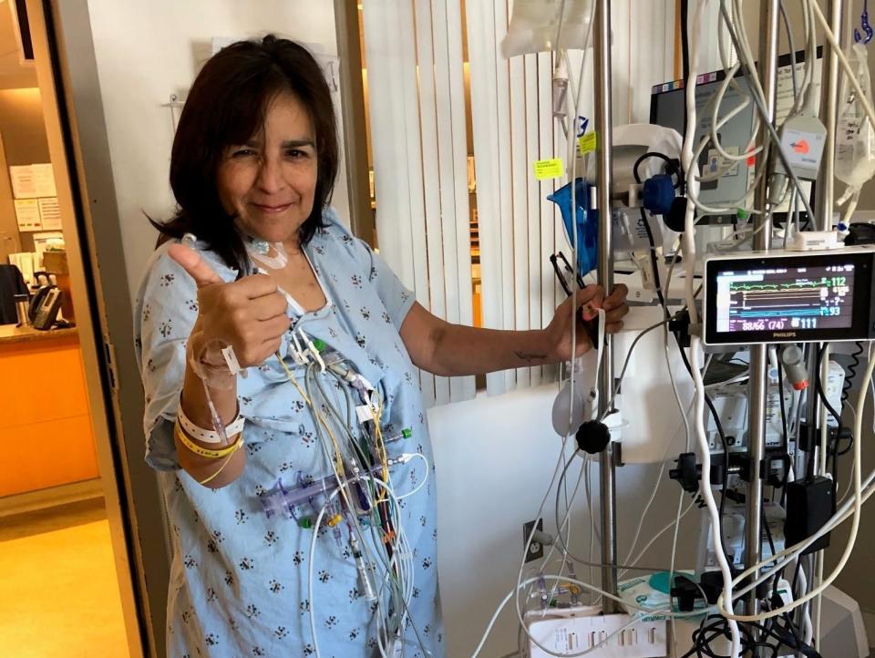 Ann Dudas in hospital standing up