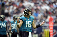 Jacksonville Jaguars quarterback Trevor Lawrence (16) reacts after a penalty called against the offense during the first half of an NFL football game against the Houston Texans Sunday, Sept. 12, 2021, in Houston. (AP Photo/Sam Craft)