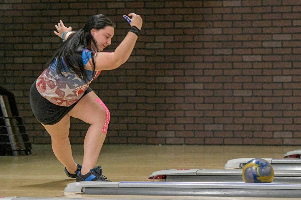 Breanna Hess rolls for Seabreeze High School during the state bowling championships at Boardwalk Bowl Entertainment Center in Orlando on Thursday, Nov. 2, 2023.