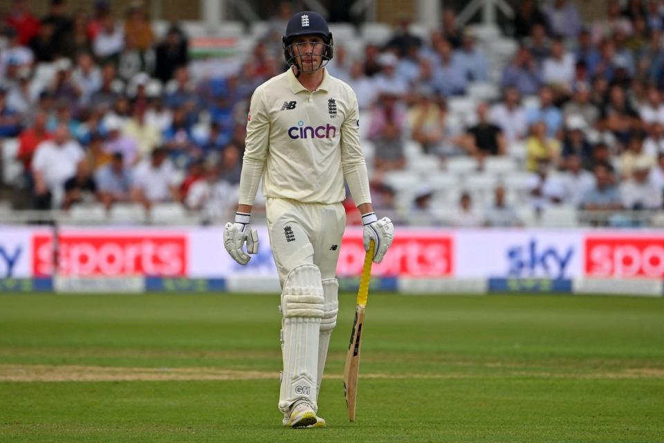 England's Dan Lawrence walks back to the pavilion after losing his wicket wicthout scoring during play on the first day of the first cricket Test match of the India Tour of England 2021 between England and India at the Trent Bridge - PAUL ELLIS/AFP via Getty Images