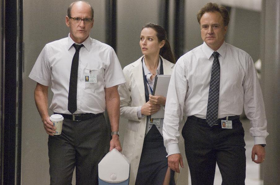 In this film image released by Lionsgate, from left, Richard Jenkins, Amy Acker and Bradley Whitford are shown in a scene from "The Cabin in the Woods." (AP Photo/Lionsgate, Diyah Pera)