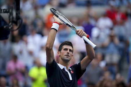 Novak Djokovic of Serbia celebrates after defeating Andreas Seppi of Italy in their third round match at the U.S. Open Championships tennis tournament in New York, September 4, 2015. REUTERS/Eduardo Munoz