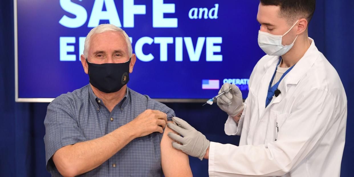 US Vice President Mike Pence receives the COVID-19 vaccine in the Eisenhower Executive Office Building in Washington, DC, December 18, 2020. (Photo by SAUL LOEB / AFP) (Photo by SAUL LOEB/AFP via Getty Images)