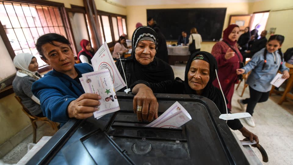 Egyptian women cast their ballot at a polling station of Shubra Secondary school in the presidential election in Cairo on December 10, 2023. - Ahmed Hasan/AFP/Getty Images