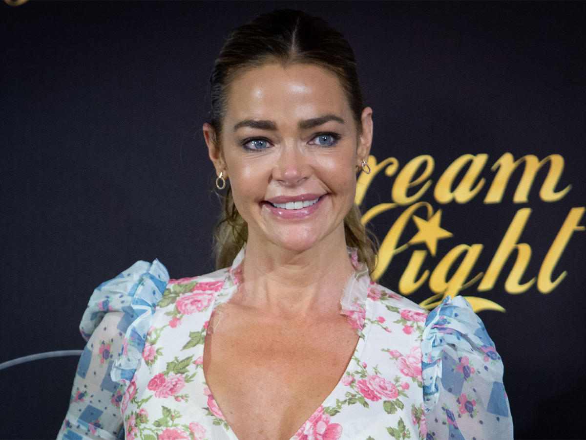 This video of Denise Richards in a dangerously plunging black dress ...