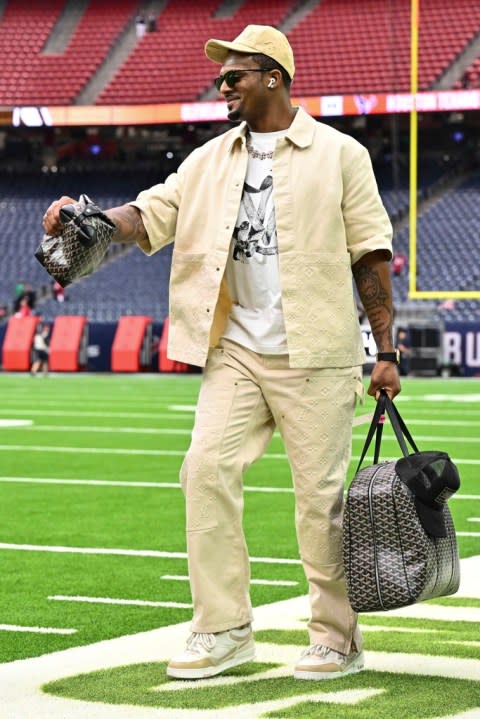 Cleveland Browns quarterback Deshaun Watson arrives prior to an NFL wild-card playoff football game, Saturday, Jan 13, 2024, in Houston. (AP Photo/Maria Lysaker)