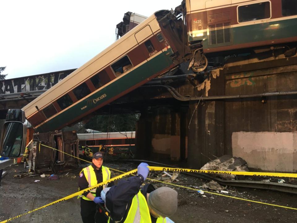 Emergency workers at the scene of the Amtrak train derailment.&nbsp;