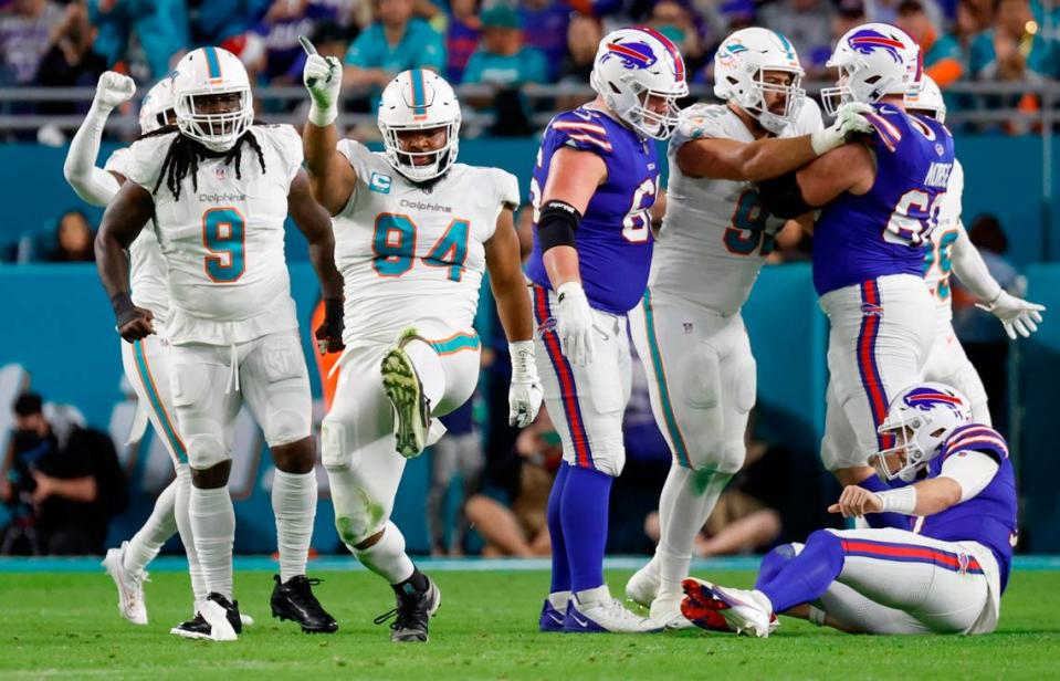 Miami Dolphins defensive tackle Christian Wilkins (94) reacts after sacking Buffalo Bills quarterback Josh Allen (17) in the first quarter at Hard Rock Stadium in Miami Gardens on Sunday, January 7, 2024.