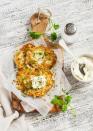 <p>It's all because the holiday celebrates oil. The most popular recipes include <a href="https://www.goodhousekeeping.com/food-recipes/easy/a46929/easy-potato-latkes-recipe/" rel="nofollow noopener" target="_blank" data-ylk="slk:latkes;elm:context_link;itc:0;sec:content-canvas" class="link ">latkes</a> (fried potato pancakes), <a href="https://www.myjewishlearning.com/article/hanukkah-foods/" rel="nofollow noopener" target="_blank" data-ylk="slk:according to My Jewish Learning;elm:context_link;itc:0;sec:content-canvas" class="link ">according to My Jewish Learning</a>. Flavors can range from sweet to salty, and they're often served with applesauce or sour cream. <br></p>