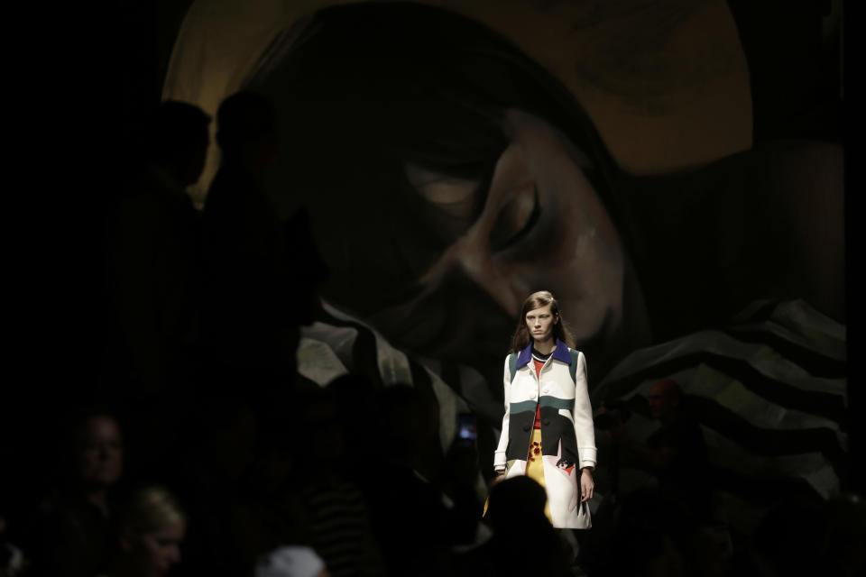 A model wears a creation for Prada's women's Spring-Summer 2014 collection, part of the Milan Fashion Week, unveiled in Milan, Italy, Thursday, Sept. 19, 2013. (AP Photo/Luca Bruno)