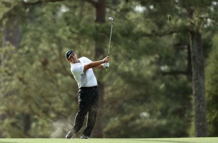 Patrick Reed of the U.S. hits on the 14th fairway during second round play of the 2018 Masters golf tournament at the Augusta National Golf Club in Augusta, Georgia, U.S., April 6, 2018. REUTERS/Lucy Nicholson