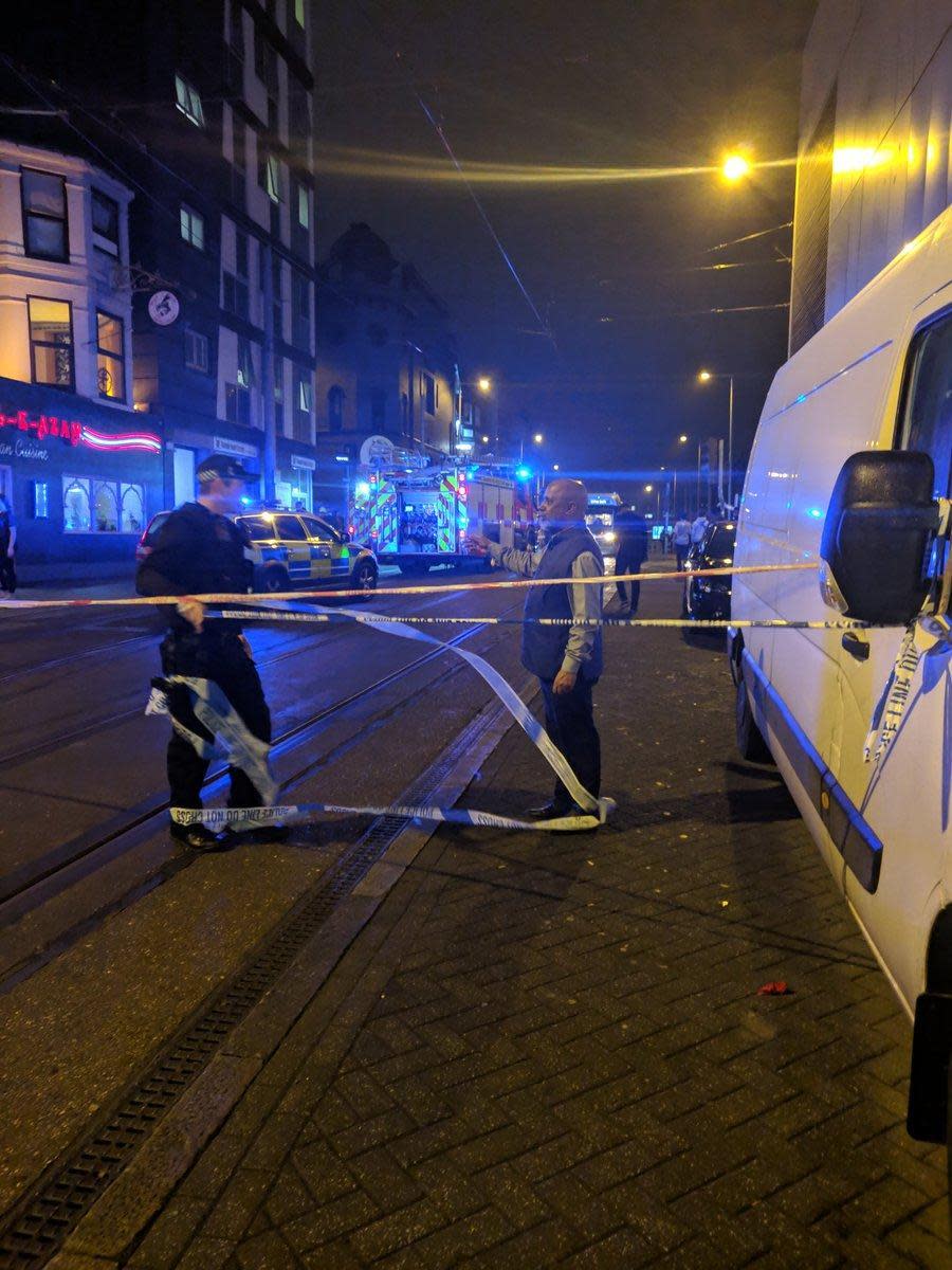 Police at the scene in Nottingham on Friday night (@JamesBStevenson/Twitter)