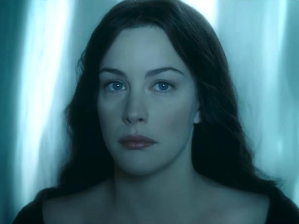 arwen in front of a light blue background in lord of the rings