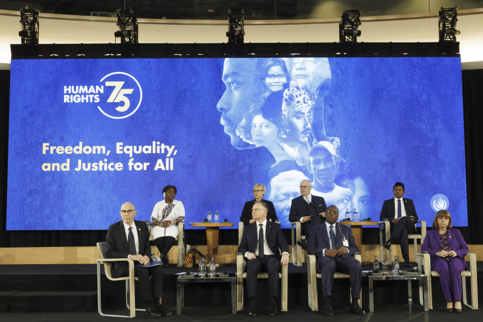 First row from left to right: U.N. High Commissioner for Human Rights Volker Turk, Poland's President Andrzej Duda, Senegal President Macky Sall and Greece's President Katerina Sakellaropoulou; second row from left to right: Colombian Vice President Francia Marquez, Slovenia's President Natasa Pirc Musar, Estonia's President Alar Karis, and Maldives' Vice President Hussain Mohamed Latheef, attend the high-level event commemorating the 75th Anniversary of the Universal Declaration of Human Rights, at the European headquarters of the United Nations in Geneva, Switzerland, Tuesday, Dec. 12, 2023. (Salvatore Di Nolfi/Keystone via AP)