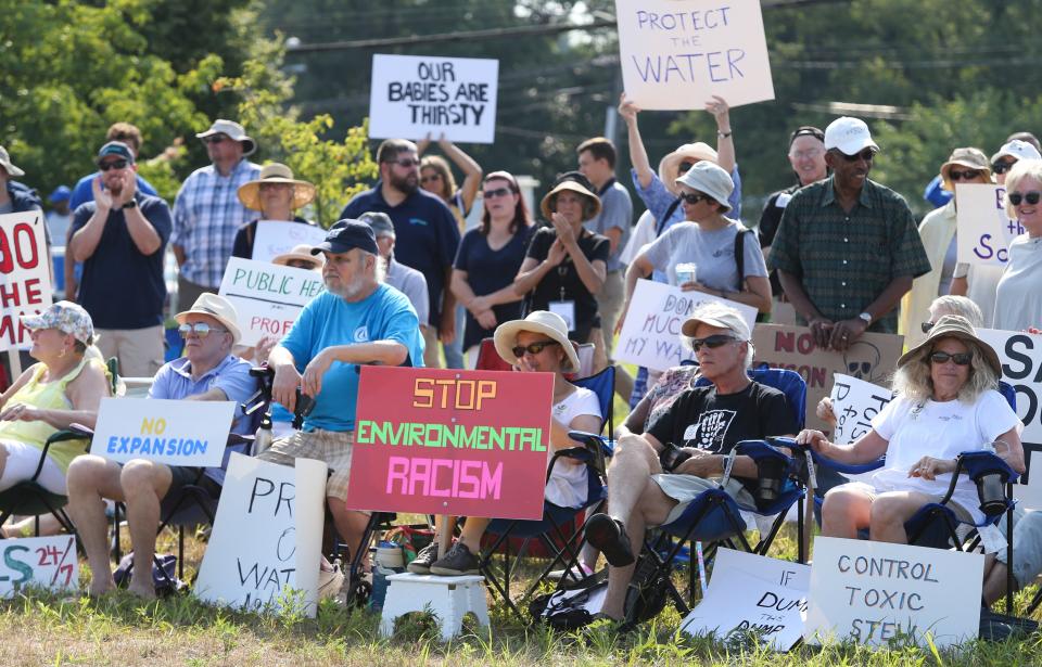 Opponents of increasing the height of the Waste Management-run landfill in Minquadale protest at the New Castle County Cpl. Paul J. Sweeney Public Safety Building in July 2019.