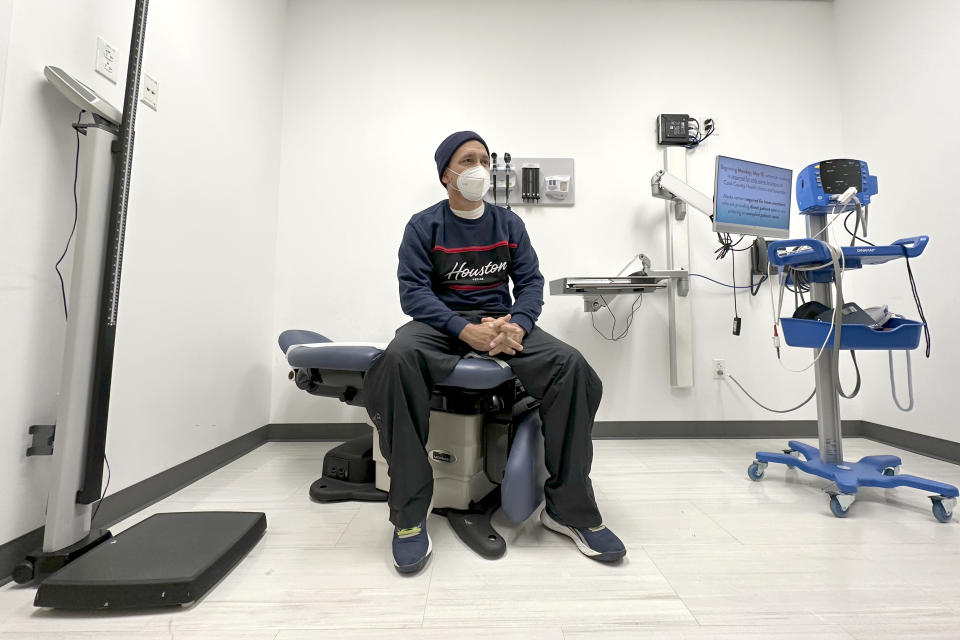 Julio Figuera, 43, talks about his life traveling to the U.S. from Venezuela and living at O'Hare International Airport while he waits for medical treatment at the Cook County, Ill., medical clinic on Monday, Oct. 16, 2023, in Chicago. "I rarely get sick," he said. "It was the journey that got me sick." Figuera, developed pneumonia since arriving in the U.S. and has been living with hundreds of other asylum seekers at the airport while awaiting more city permanent shelter. When migrants began arriving in Chicago last year, city leaders tapped the county's health system to take over medical care. (AP Photo/Charles Rex Arbogast)