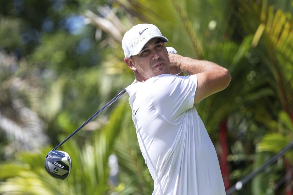 Captain Brooks Koepka, of Smash GC, hit from the 10th tee during the final round of LIV Golf Singapore at Sentosa Golf Club, Sunday, May 5, 2024, in Sentosa, Singapore. (Doug DeFelice/LIV Golf via AP)