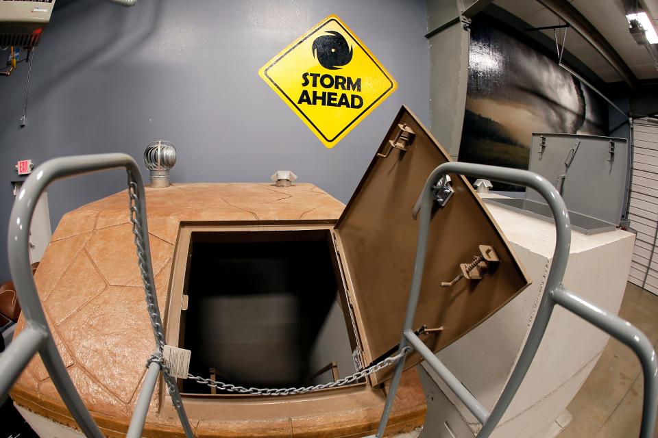 A below-ground storm shelter is displayed at EF5 Tornado Shelters, 14300 N Lincoln Blvd., No. 100.