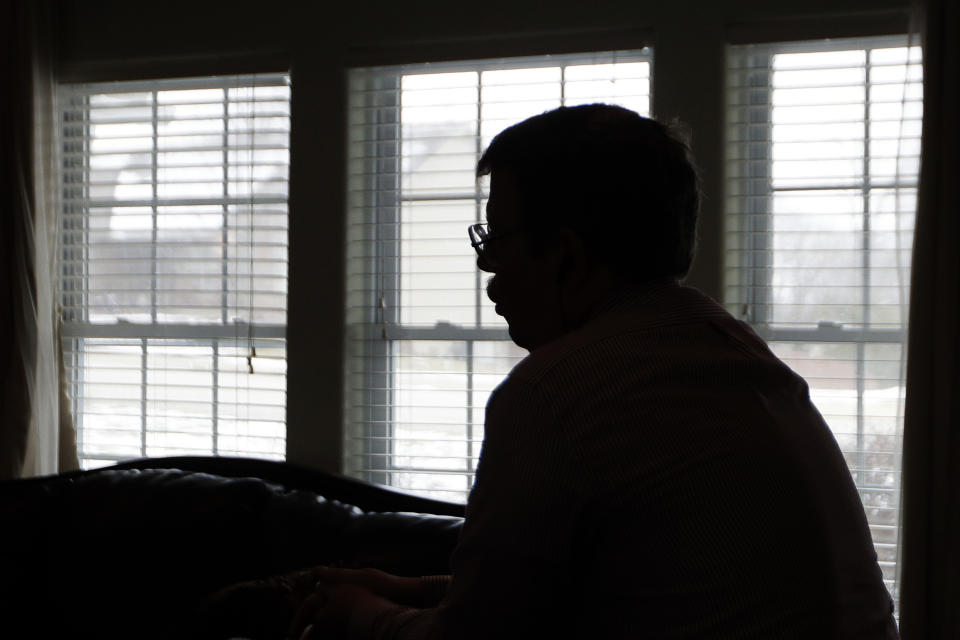 In this Feb. 20, 2019 photo, Facebook blogger Darrell Todd Maurina speaks during an interview at his house in Waynesville, Mo. Maurina says journalists need to go back to the basics to survive, or revive, in small-town America. (AP Photo/Orlin Wagner)