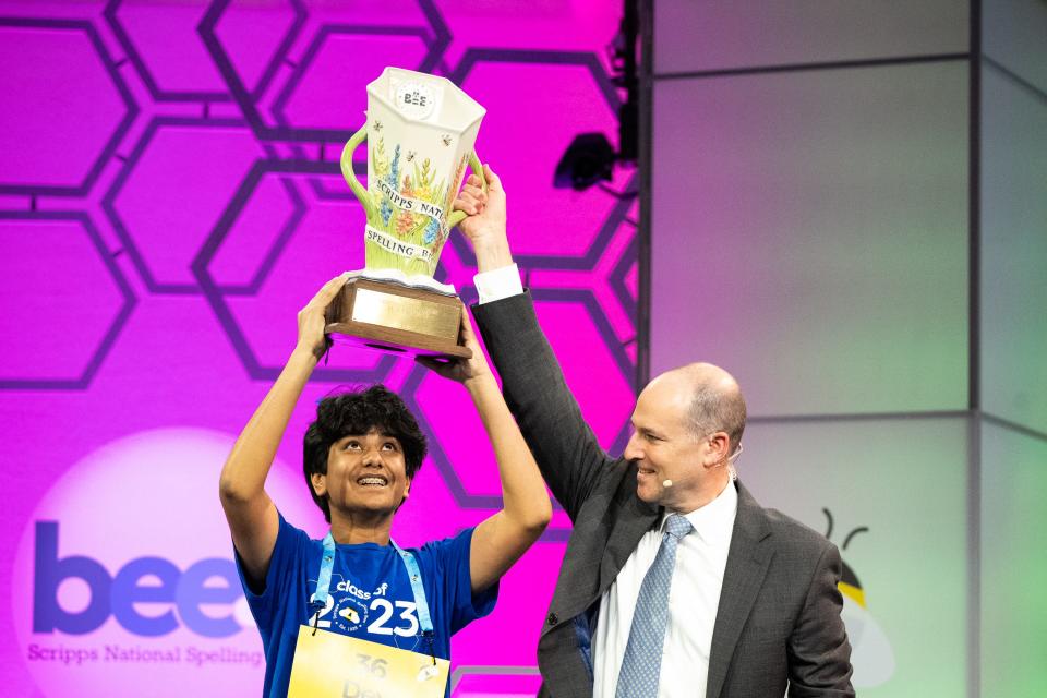 Dev Shah, 14, from Largo, Fla., celebrates after winning the 2023 Scripps National Spelling Bee.
