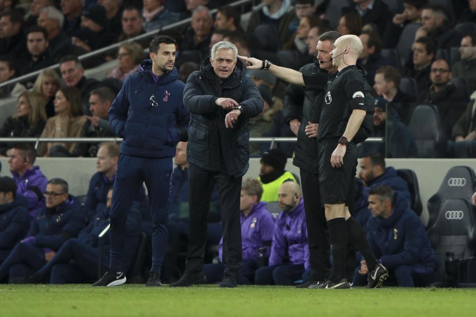 Tottenham's manager Jose Mourinho calls for referee's attention during the English Premier League soccer match between Tottenham Hotspur and Chelsea, at the Tottenham Hotspur Stadium in London, Sunday, Dec. 22, 2019. (AP Photo/Ian Walton)