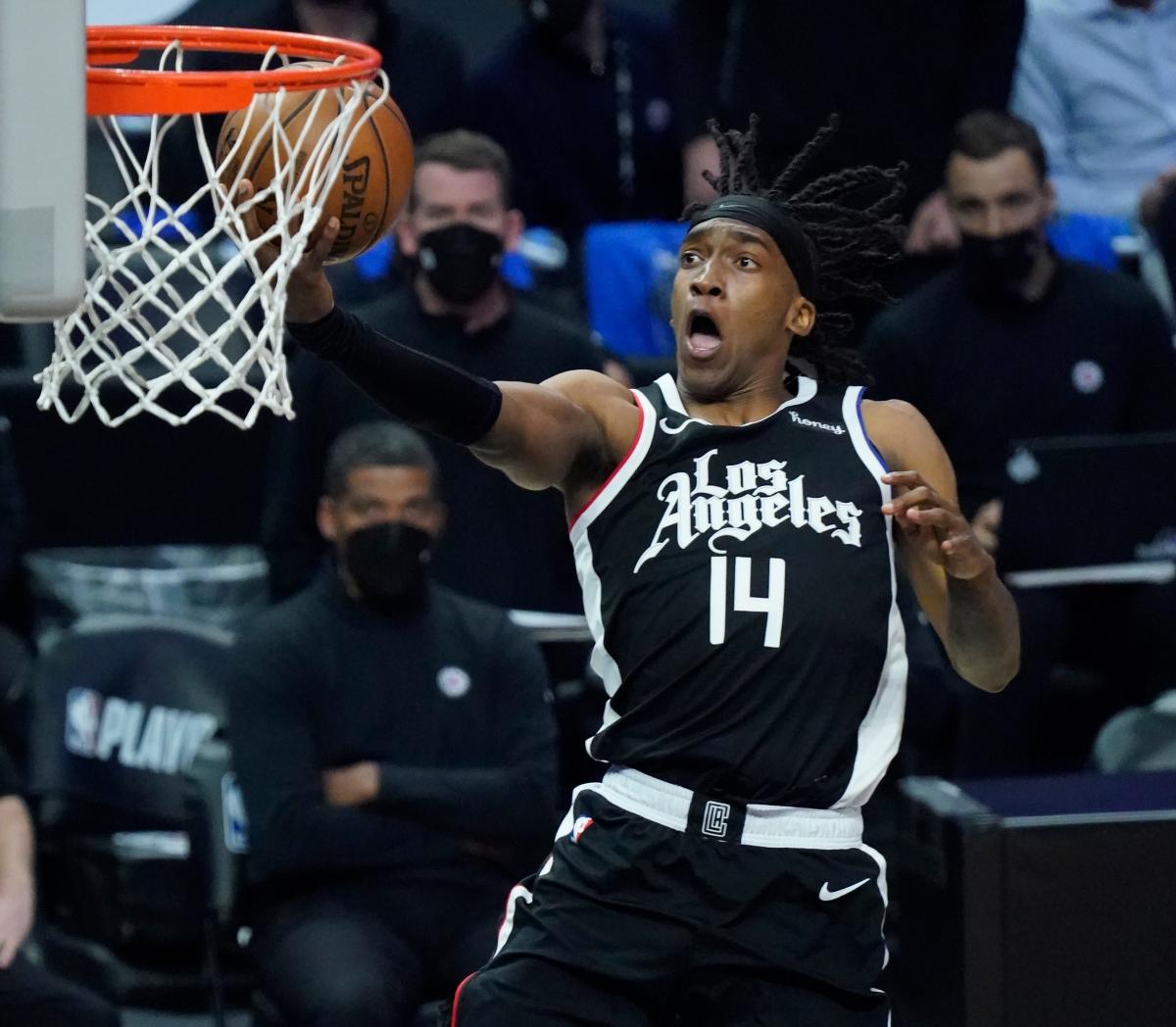 Terance Mann of the LA Clippers goes to the basket during the game