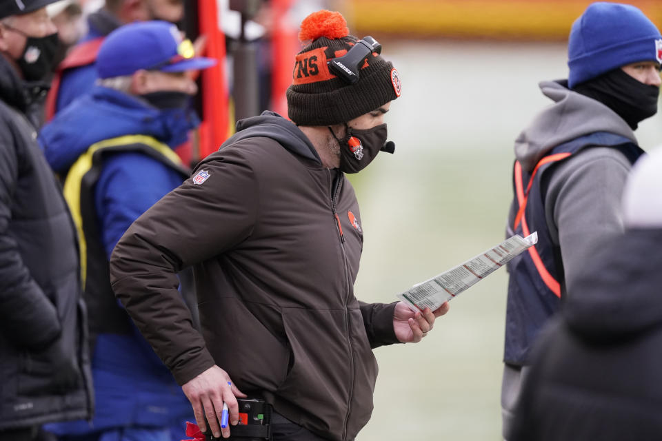 Cleveland Browns head coach Kevin Stefanski watches from the bench during the first half of an NFL divisional round football game against the Kansas City Chiefs, Sunday, Jan. 17, 2021, in Kansas City. (AP Photo/Charlie Riedel)