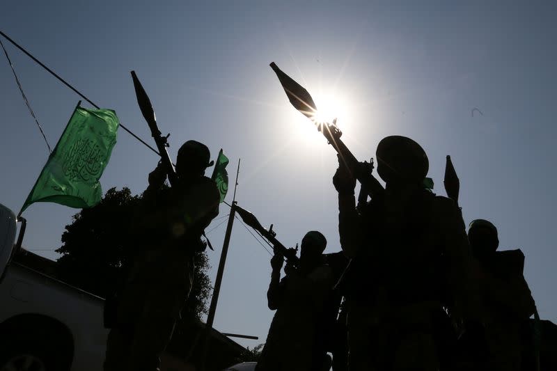 Palestinian Hamas militants take part in an anti-Israel military show in the southern Gaza Strip