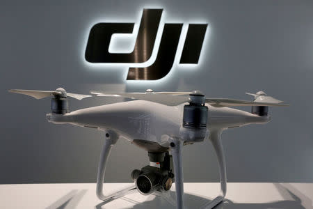 FILE PHOTO: A drone is displayed at DJI's flagship store in Hong Kong, China September 22, 2016. REUTERS/Bobby Yip/File Photo