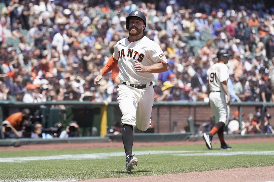 San Francisco Giants' Donovan Walton scores against the New York Mets during the second inning of a baseball game in San Francisco, Wednesday, May 25, 2022. (AP Photo/Jeff Chiu)