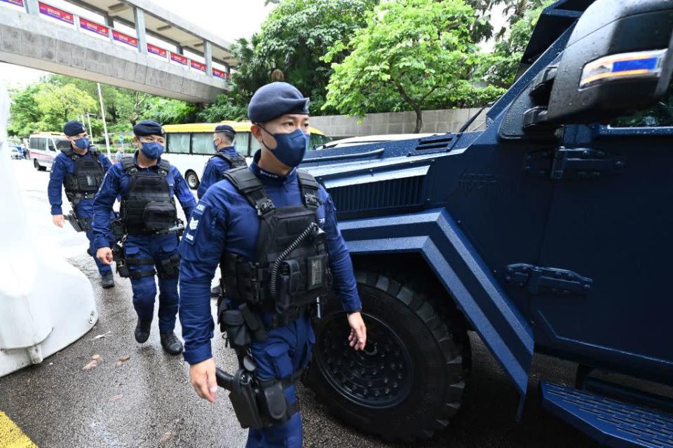 A special unit of the Hong Kong patrols the city's Wan Chai district on June 30, 2022, as Chinese President Xi Jinping arrives in Hong Kong to attend celebrations marking the 25th anniversary of the city's handover from Britain to China.<span class="copyright">Peter Parks—AFP/Getty Images</span>
