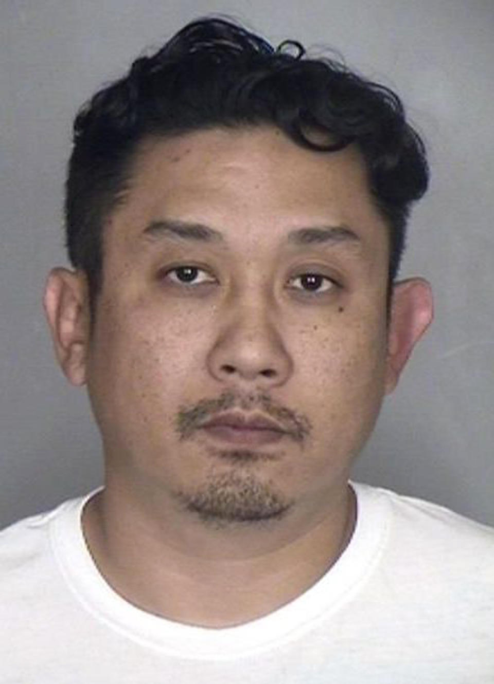 In this undated photo released by the Butte County Sheriff's Office is Sam Koh. The Northern California man hid one of British Columbia's most wanted fugitives in a 2008 killing in the days before his violent arrest, authorities alleged Wednesday, Dec. 11, 2019. Butte County sheriff's deputies said Koh, 40, of Gridley, harbored Brandon Teixeira, 28, in the days before the Canadian man rammed his SUV into a sheriff's armored van while trying to escape earlier this month. (Butte County Sheriff's Office via AP)