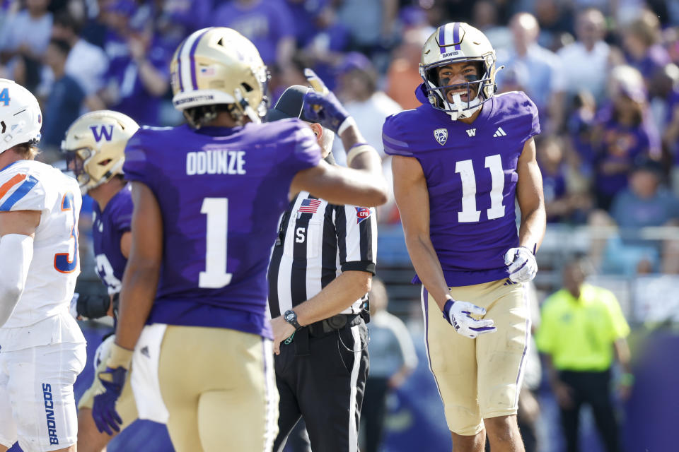 Sep 2, 2023; Seattle, Washington, USA; Washington Huskies wide receiver <a class="link " href="https://sports.yahoo.com/ncaaf/players/311564" data-i13n="sec:content-canvas;subsec:anchor_text;elm:context_link" data-ylk="slk:Jalen McMillan;sec:content-canvas;subsec:anchor_text;elm:context_link;itc:0">Jalen McMillan</a> (11) rushes for a touchdown against the Boise State Broncos during the fourth quarter at Alaska Airlines Field at Husky Stadium. Mandatory Credit: Joe Nicholson-USA TODAY Sports