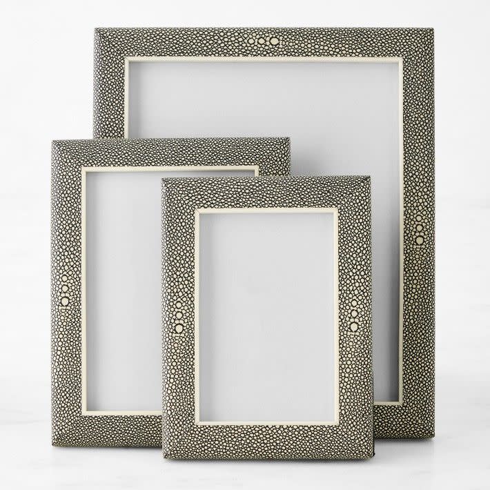 <p><a href="https://go.redirectingat.com?id=74968X1596630&url=https%3A%2F%2Fwww.williams-sonoma.com%2Fproducts%2Ffaux-shagreen-picture-frames&sref=https%3A%2F%2F" rel="nofollow noopener" target="_blank" data-ylk="slk:Shop Now;elm:context_link;itc:0;sec:content-canvas" class="link ">Shop Now</a></p><p>Faux Shagreen Picture Frames</p><p>williams-sonoma.com</p><p>$95.00</p>