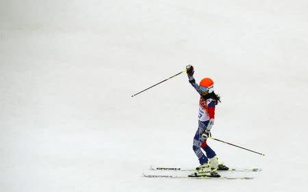 Vanessa Mae, competing for Thailand under her father's name Vanessa Vanakorn, reacts after the second run of the women's alpine skiing giant slalom event at the 2014 Sochi Winter Olympics at the Rosa Khutor Alpine Center February 18, 2014. REUTERS/Ruben Sprich
