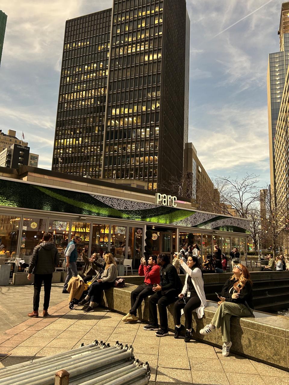 Lights came on in downtown Detroit's Campus Marius during the solar eclipse on Monday, April 8, 2024.