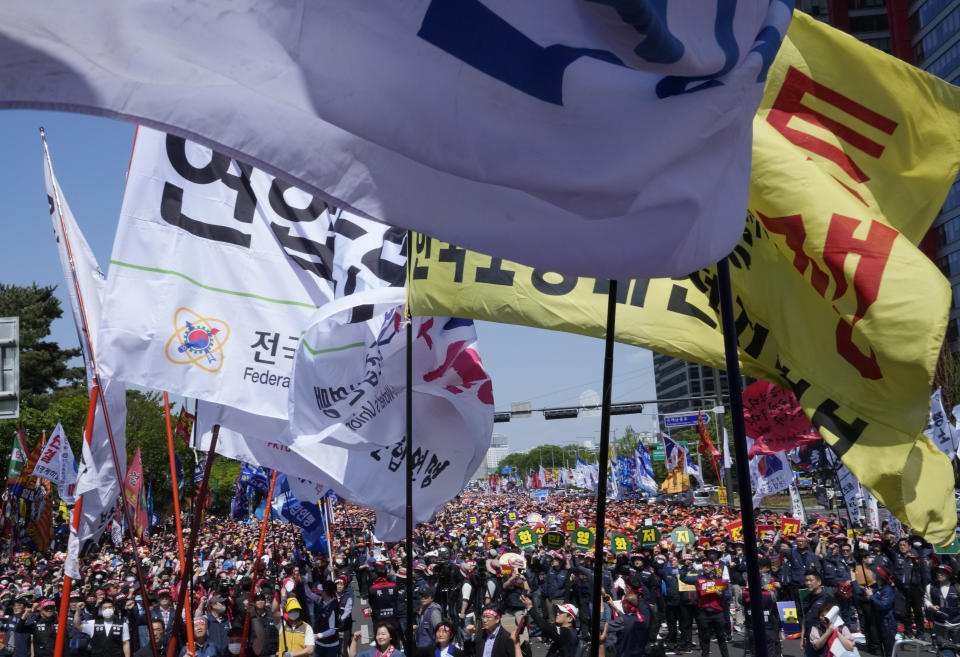 Members of Federation of Korean Trade Unions stage a rally on May Day in Seoul, South Korea, Monday, May 1, 2023. A large number of workers and activists in Asian countries were marking May Day on Monday with protests calling for higher salaries, reduced working hours and other better working conditions. (AP Photo/Ahn Young-joon)