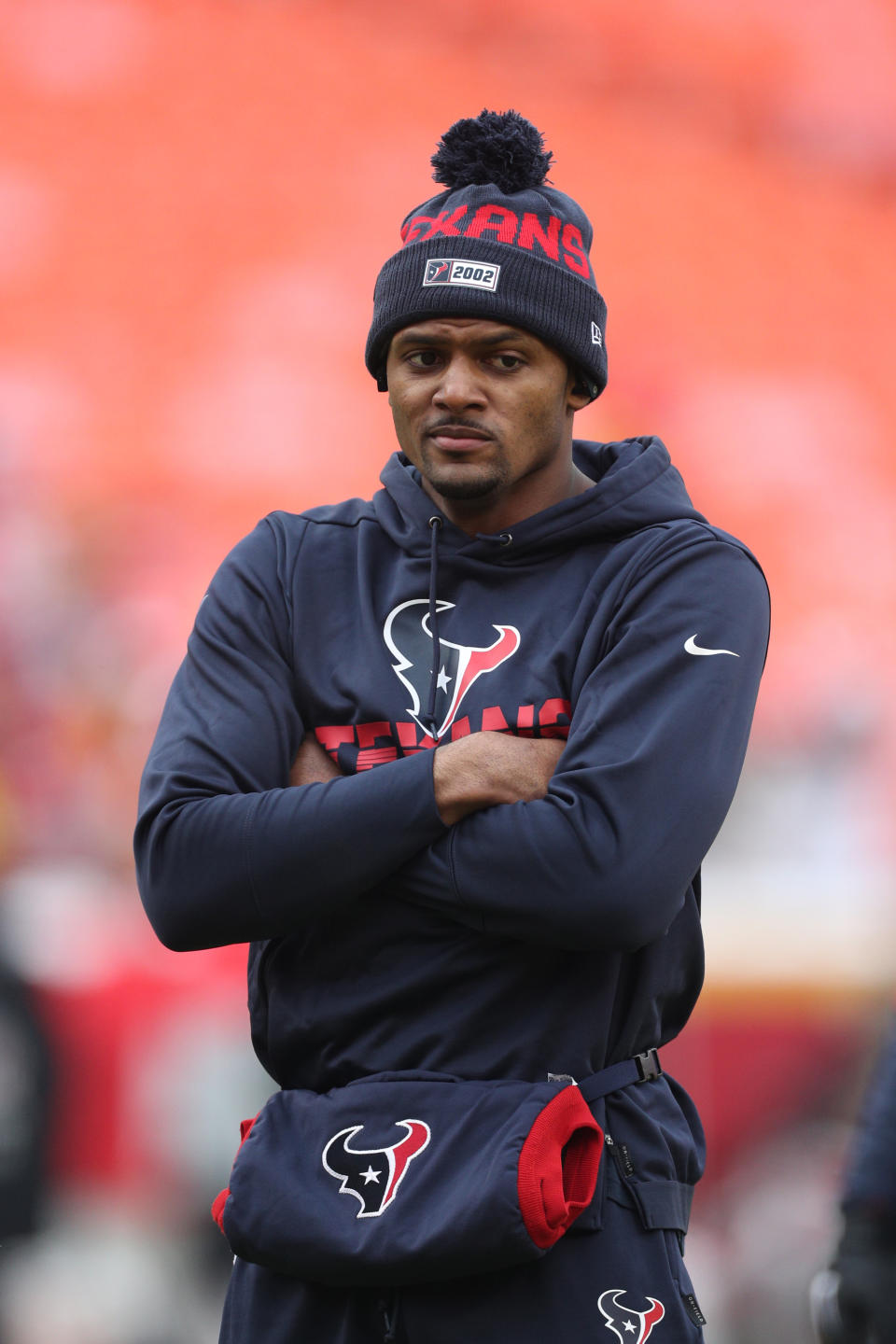 Houston Texans quarterback Deshaun Watson (4) tries to keep his hands warm for pregame warm-ups during an NFL divisional playoff game against the Kansas City Chiefs, Sunday, Jan. 12, 2020 in Kansas City. (Margaret Bowles via AP)