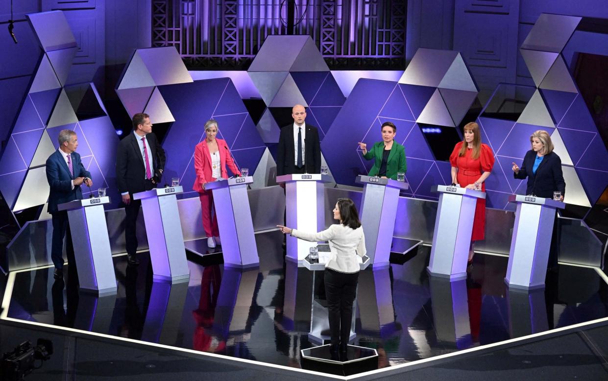 Britain's Reform UK party Leader Nigel Farage, Leader of Plaid Cymru Rhun ap Iorwerth, Britain's Deputy Leader of the Liberal Democrats Daisy Cooper, Leader of the Scottish National Party (SNP) Stephen Flynn, Co-leader of the Green Party of England and Wales Carla Denyer, Britain's Labour Party deputy leader Angela Rayner, Britain's Leader of the House of Commons Penny Mordaunt take part in a BBC election debate